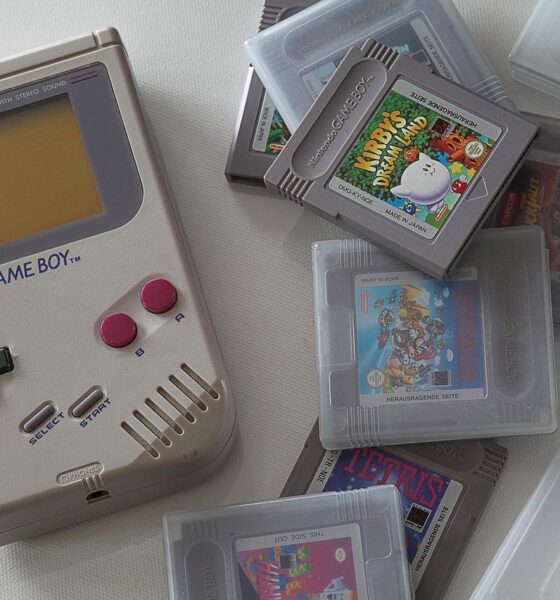 Game Boy and Games for Game Boy on table