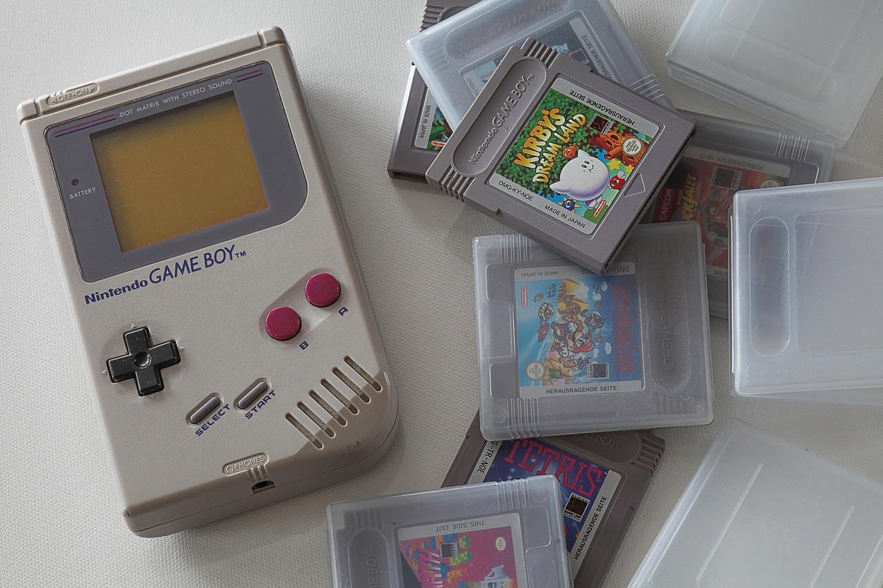 Game Boy and Games for Game Boy on table