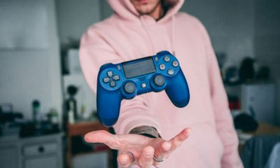 Guy Holding Gaming Controller