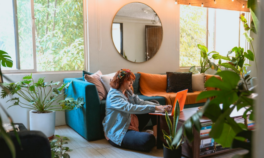 Woman on laptop in living room