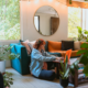 Woman on laptop in living room