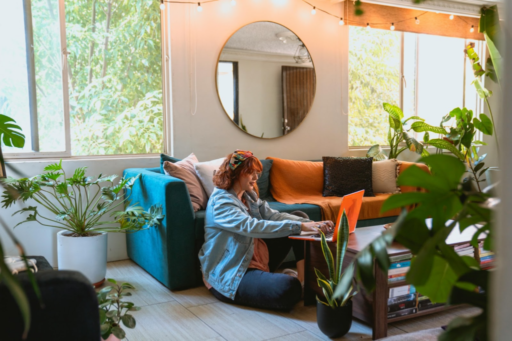 Woman on laptop in living room