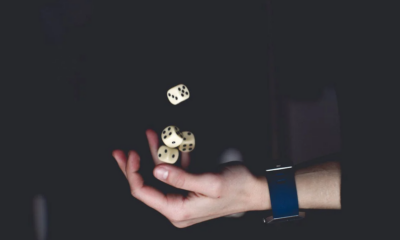Hand throwing dices