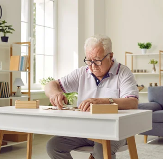 Elderly man playing game