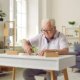 Elderly man playing game