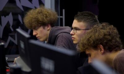 Three Gamers in a Gaming Club