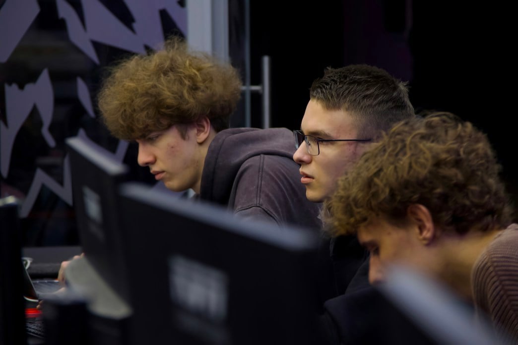 Three Gamers in a Gaming Club